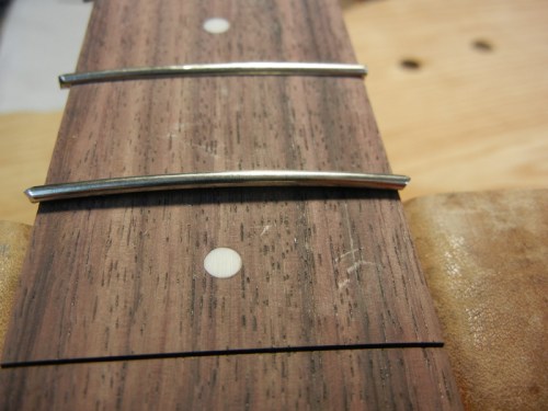 bent fret ready for installation