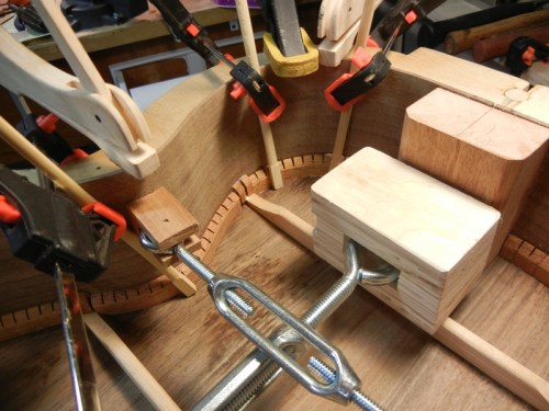 gluing the linings to attach the back plate