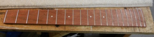fingerboard already fretted, ready for assembly to neck