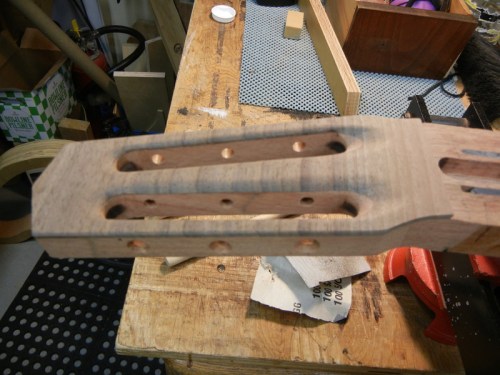 headstock with tuner holes and slots - cut and sanded