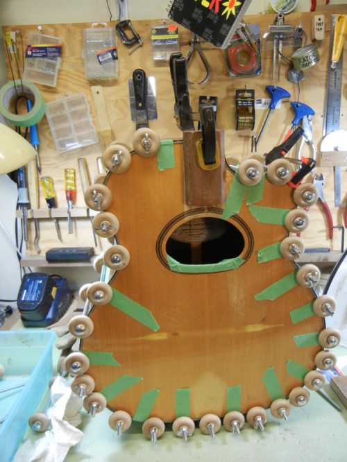 gluing the newly repaired top back on